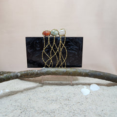 Three Stone Criss Cross Clutch