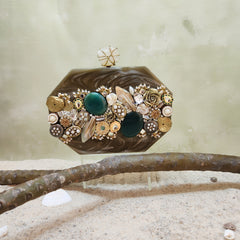 The Meena mosaic clutch