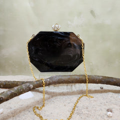 The Meena mosaic clutch