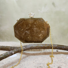 The Meena mosaic clutch