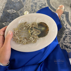 The Aura Clutch in shades of Ivory