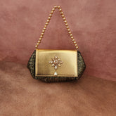 Batua Bag In Black And Gold With Gold Crystal Hanging Broach