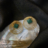 Wired studs in green corundum stone