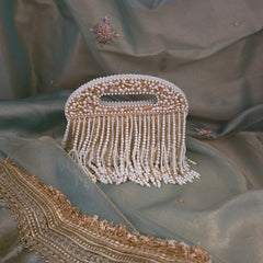 Falling pearl clutch bag
