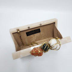 Three stone criss cross clutch multi