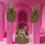 Floral Handle Bucket Bag in bronze vegan leather with brass floral handle