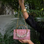 Pearl crystal bunch handle bag in baby pink with pearl handle