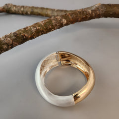 Dual tone broad cuff