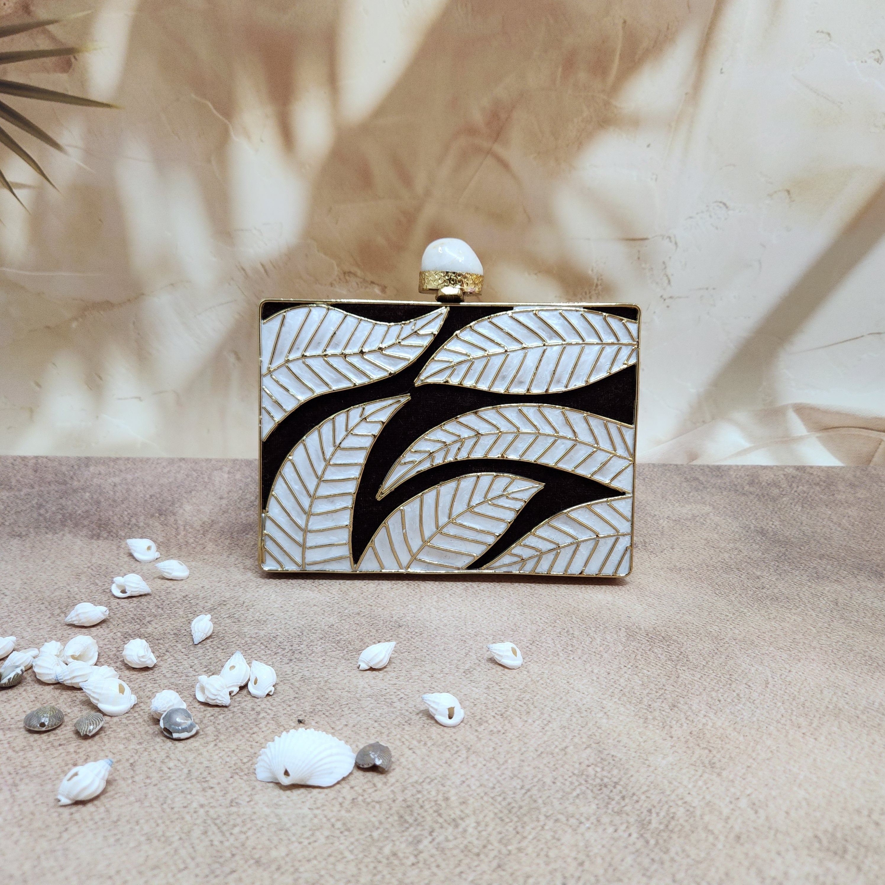 The Aaroohi Clutch [ gold] Main image