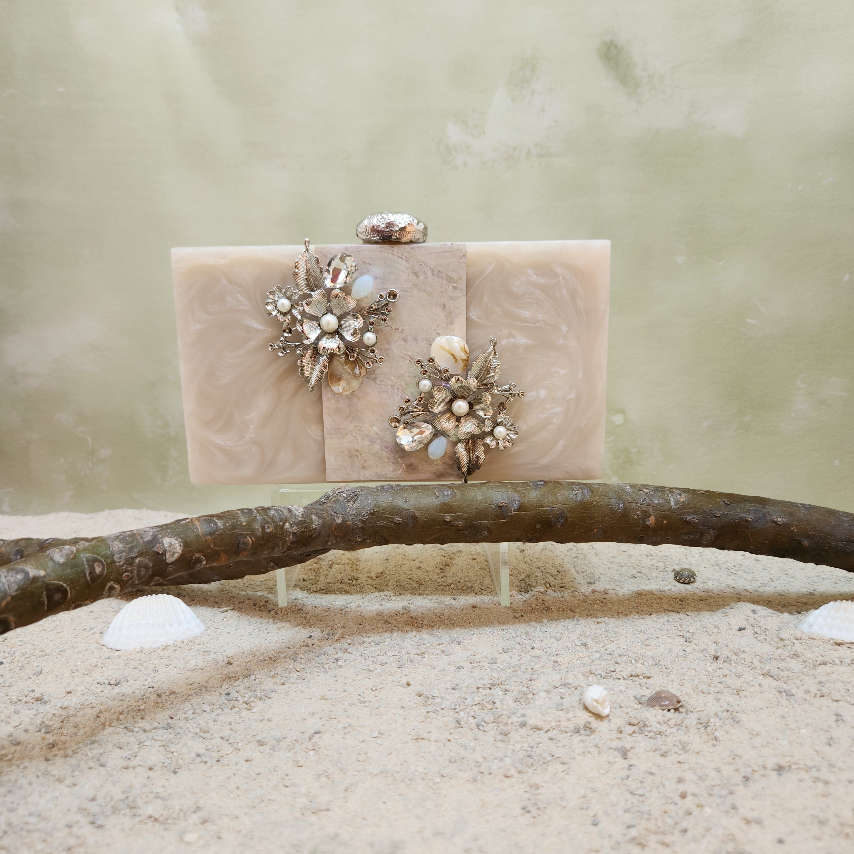 The Rhea Clutch in Silver Main image