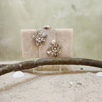 The Rhea Clutch in Silver