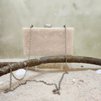 The Rhea Clutch in Silver
