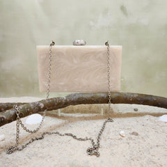 The Rhea Clutch in Silver