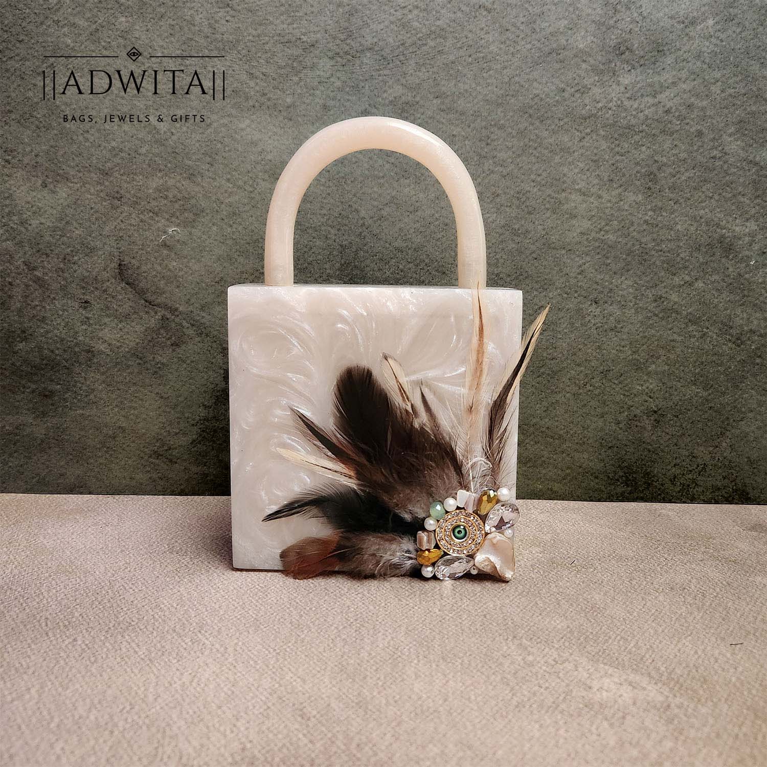Feather saga evil eye mini bag