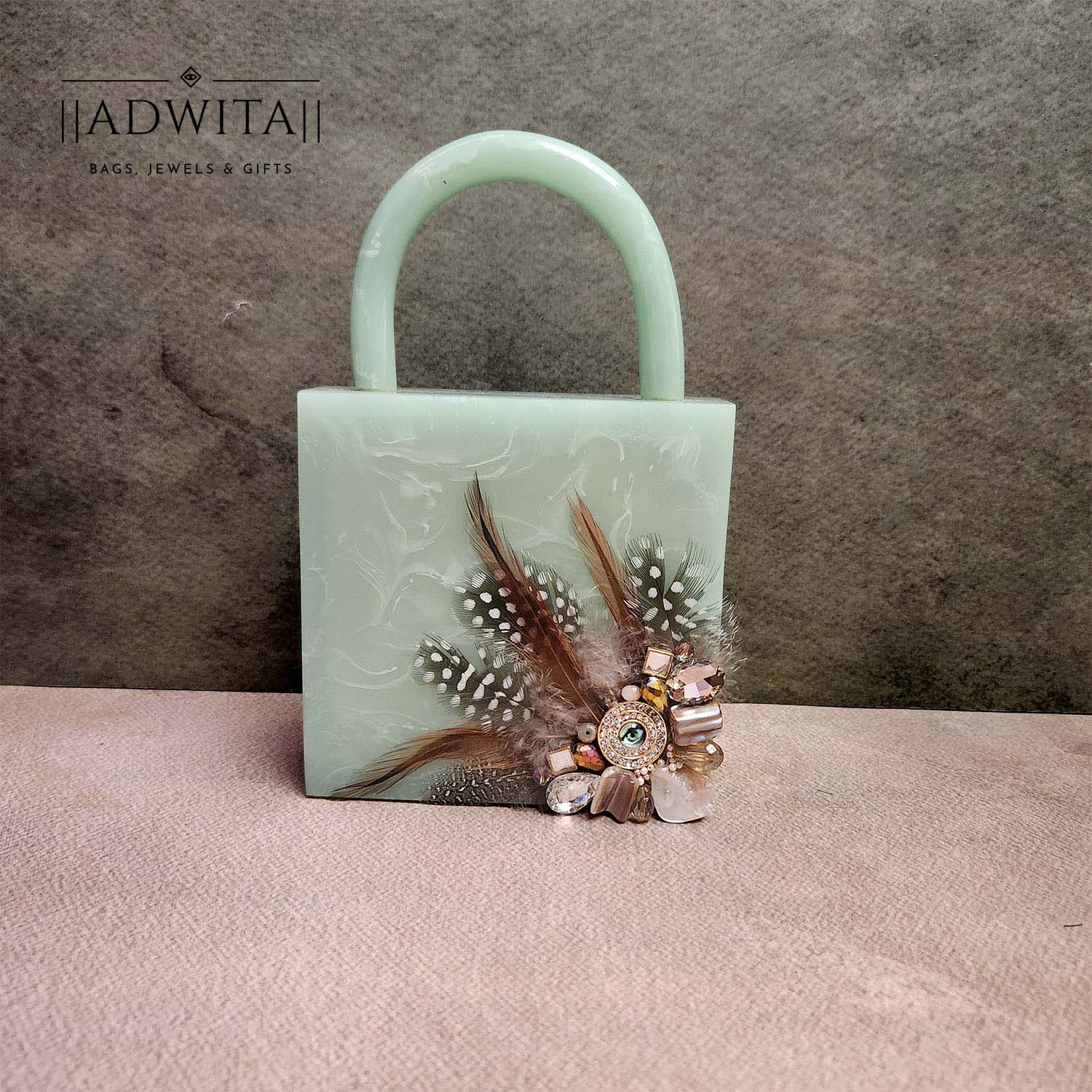 Feather saga evil eye mini bag