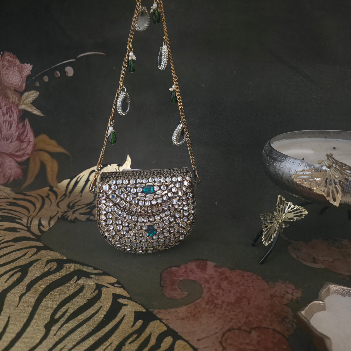 Mini kundan bag with hint of green in antique gold