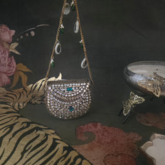 Mini kundan bag with hint of green in antique gold