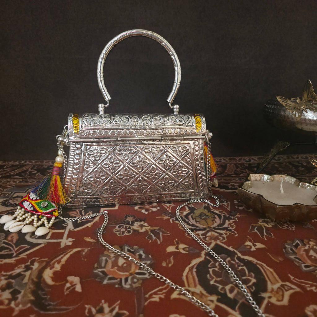 Multi meenakari bag with top brass handle