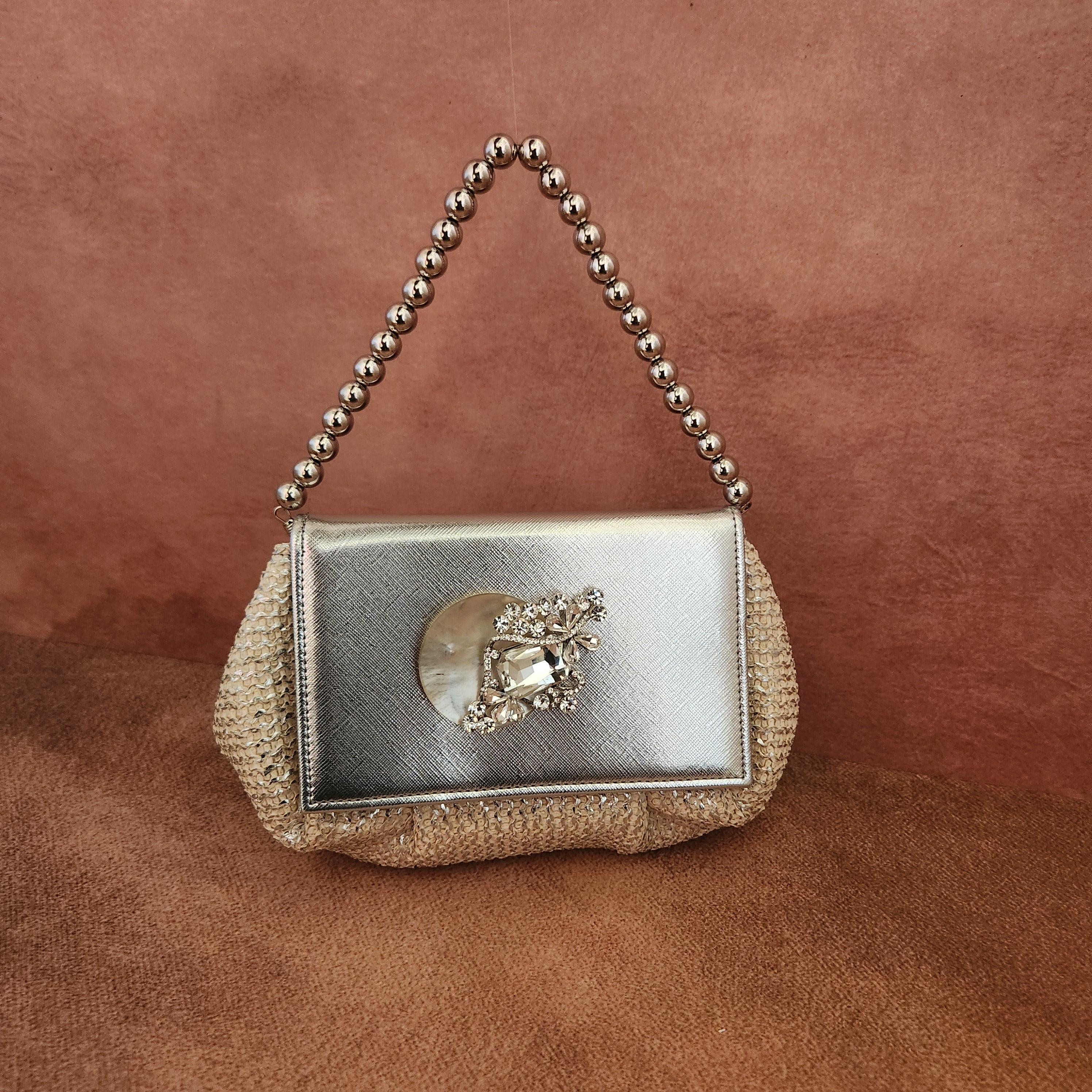 Batua Bag In White And Silver With Clear Crystal Broach With Mother Of Pearl Shell Main image