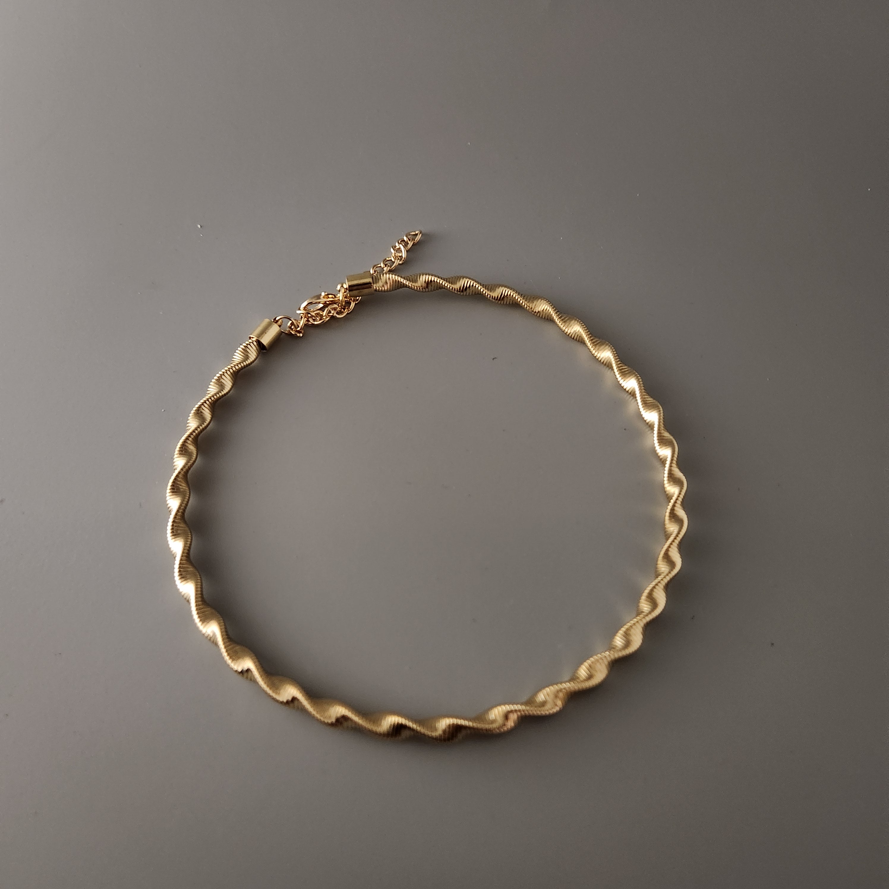 Twisted hasli gold