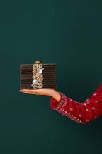 Raas bag in antique gold with natural stone detailing