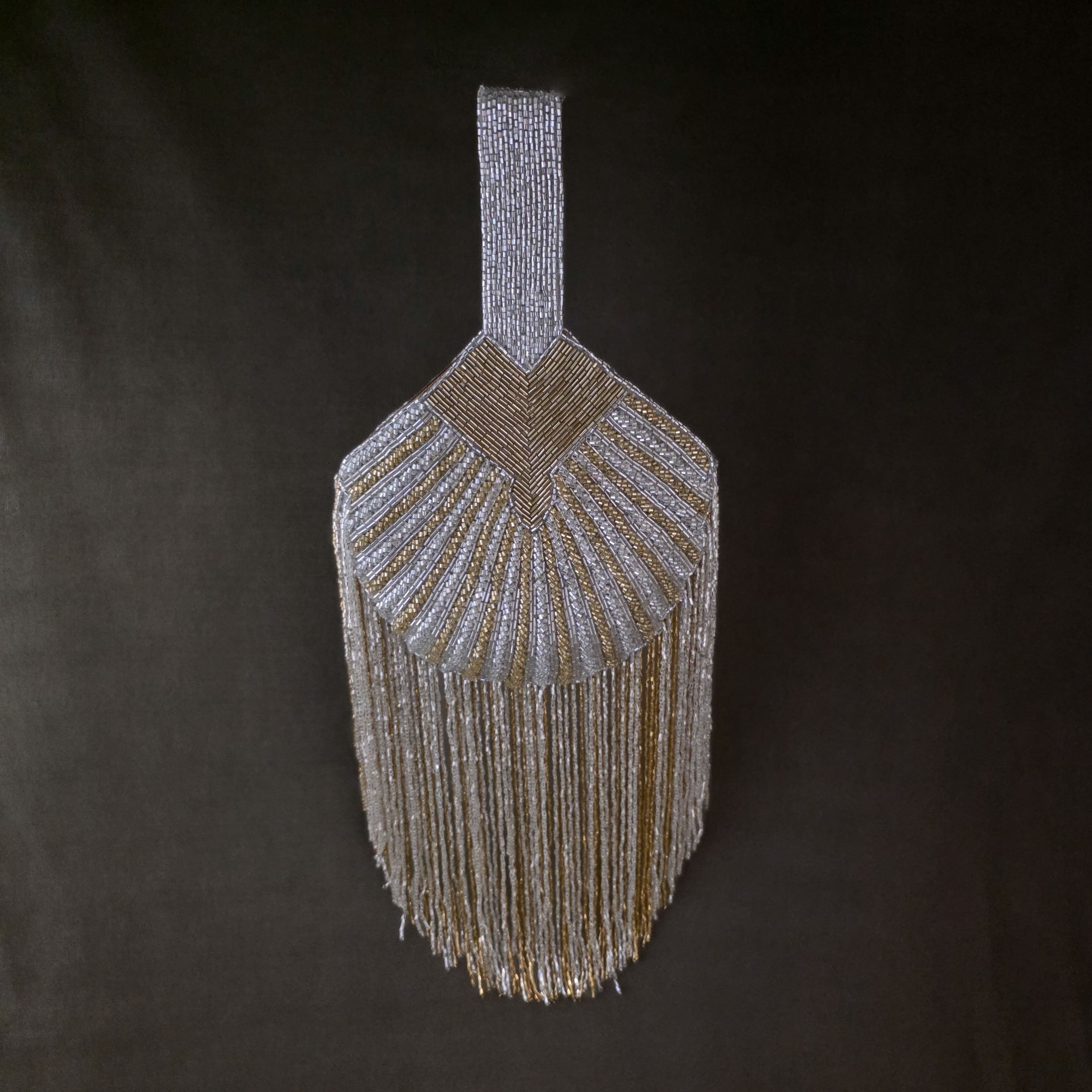 Falling cutdana bag in multi gold and silver Main image