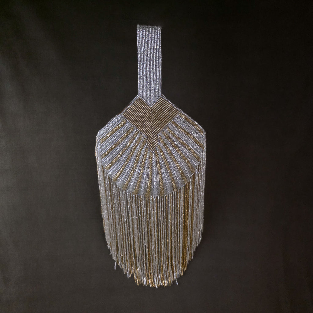 Falling cutdana bag in multi gold and silver
