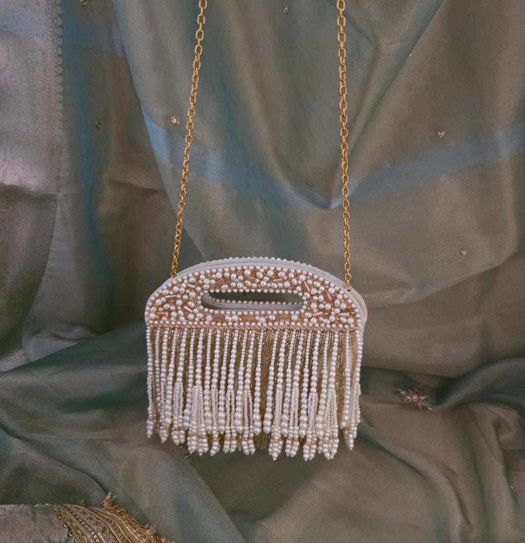 Falling pearl clutch bag