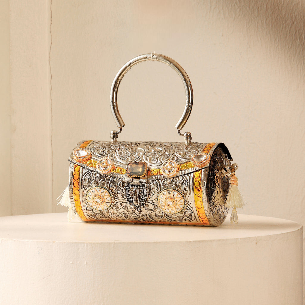 Amrita bag in silver with gold hints