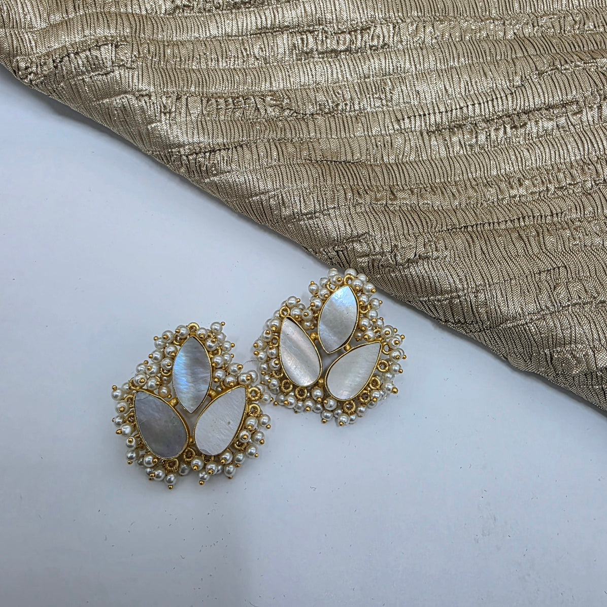 Three pearl leaf earring