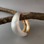 Dual tone broad cuff
