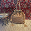 Golden crystal and suede potli bag
