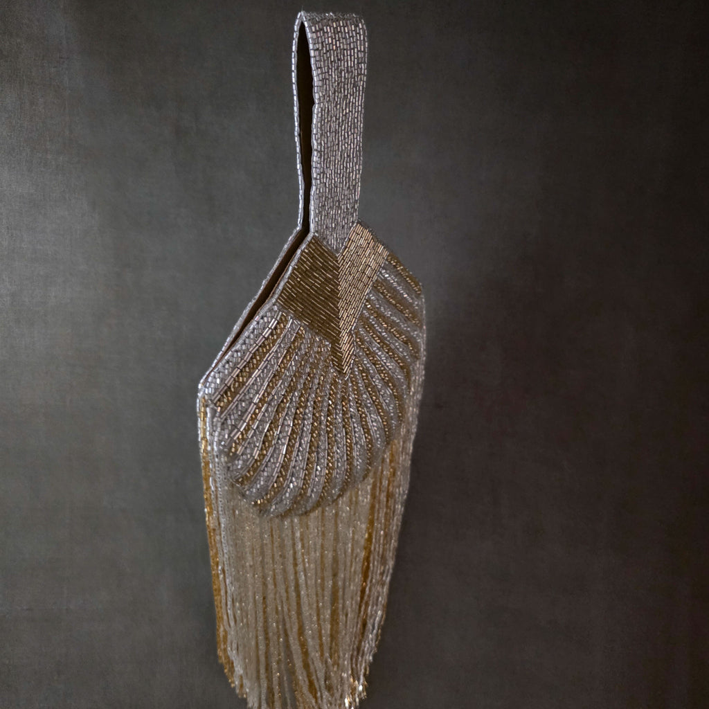 Falling cutdana bag in multi gold and silver