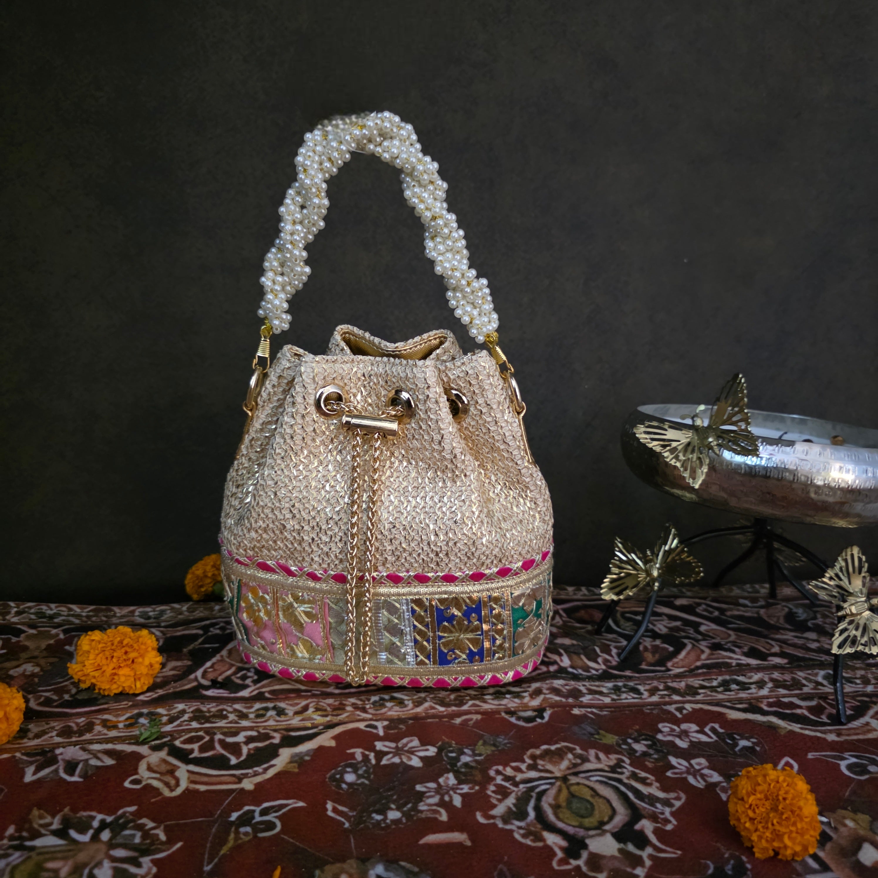 Gotapatti bucket bag in shades of gold Main image