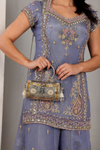 Amrita bag in silver with gold hints